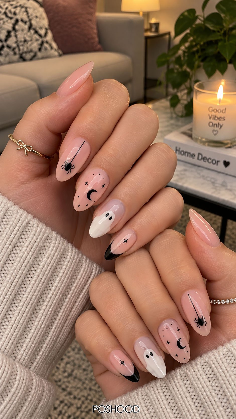Cute Halloween nails ideas featuring pink nails with black spider web details, ghost nail art, crescent moons, and black French tips.