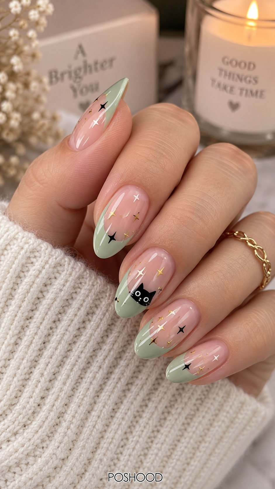 Cute Halloween nails ideas featuring sage green French tips, black cat nail art, gold stars, and glossy almond-shaped pink nails.