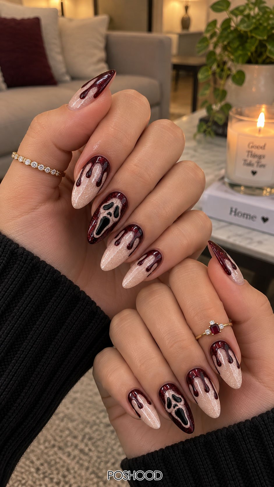Cute Halloween nails ideas featuring burgundy blood drip nail art, a spooky ghost accent, and glittery nude almond nails.